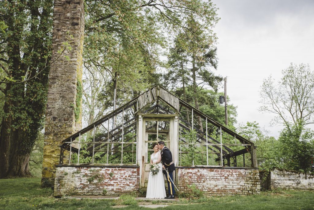 greenhouse wedding with bride and groom